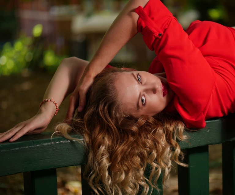 Girl-in-red-on-bench